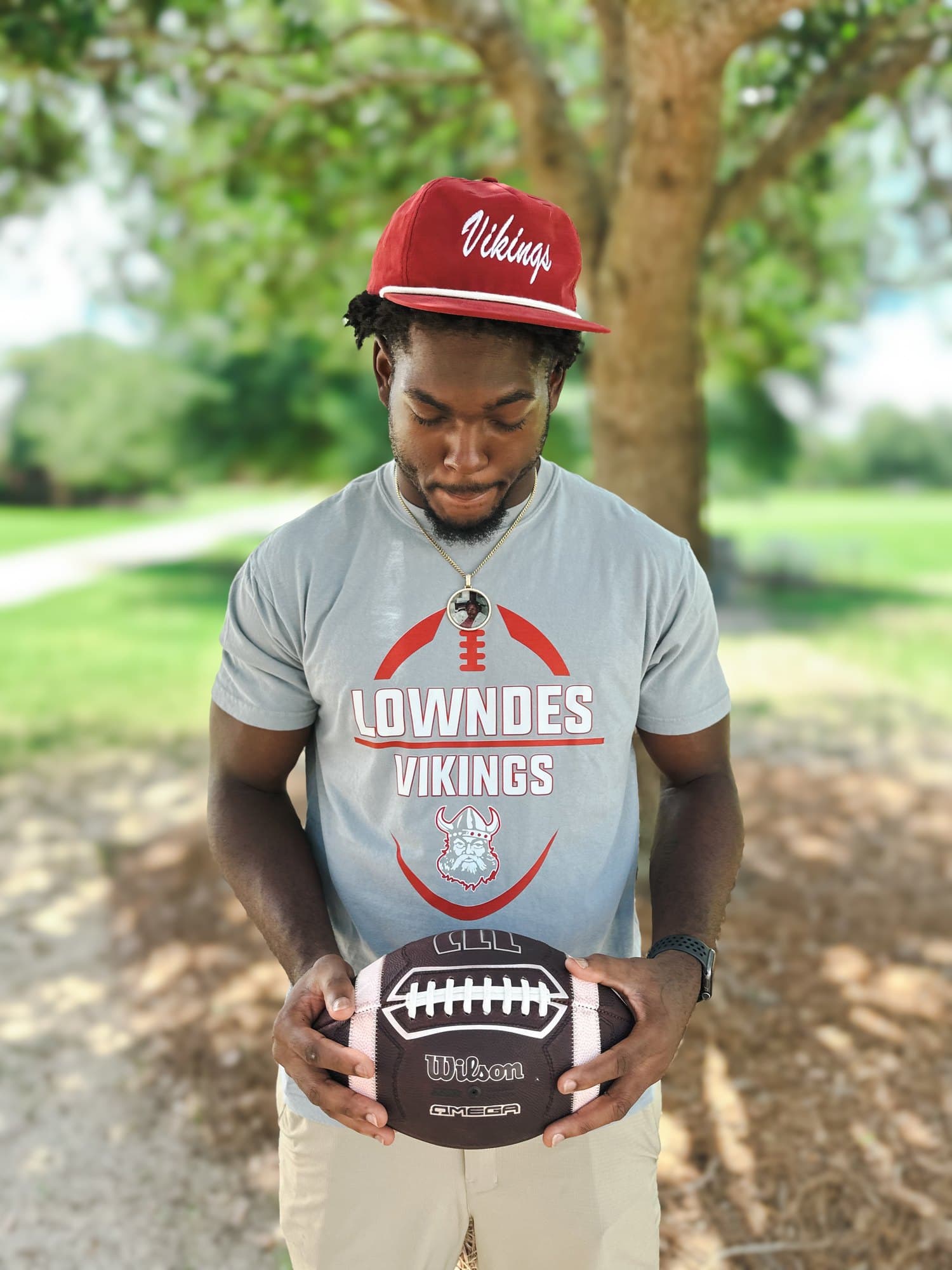 A Lowndes Vikings football tee worn with a Vikings rope cap